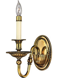 Cambridge Single Candle Sconce in Burnished Brass.
